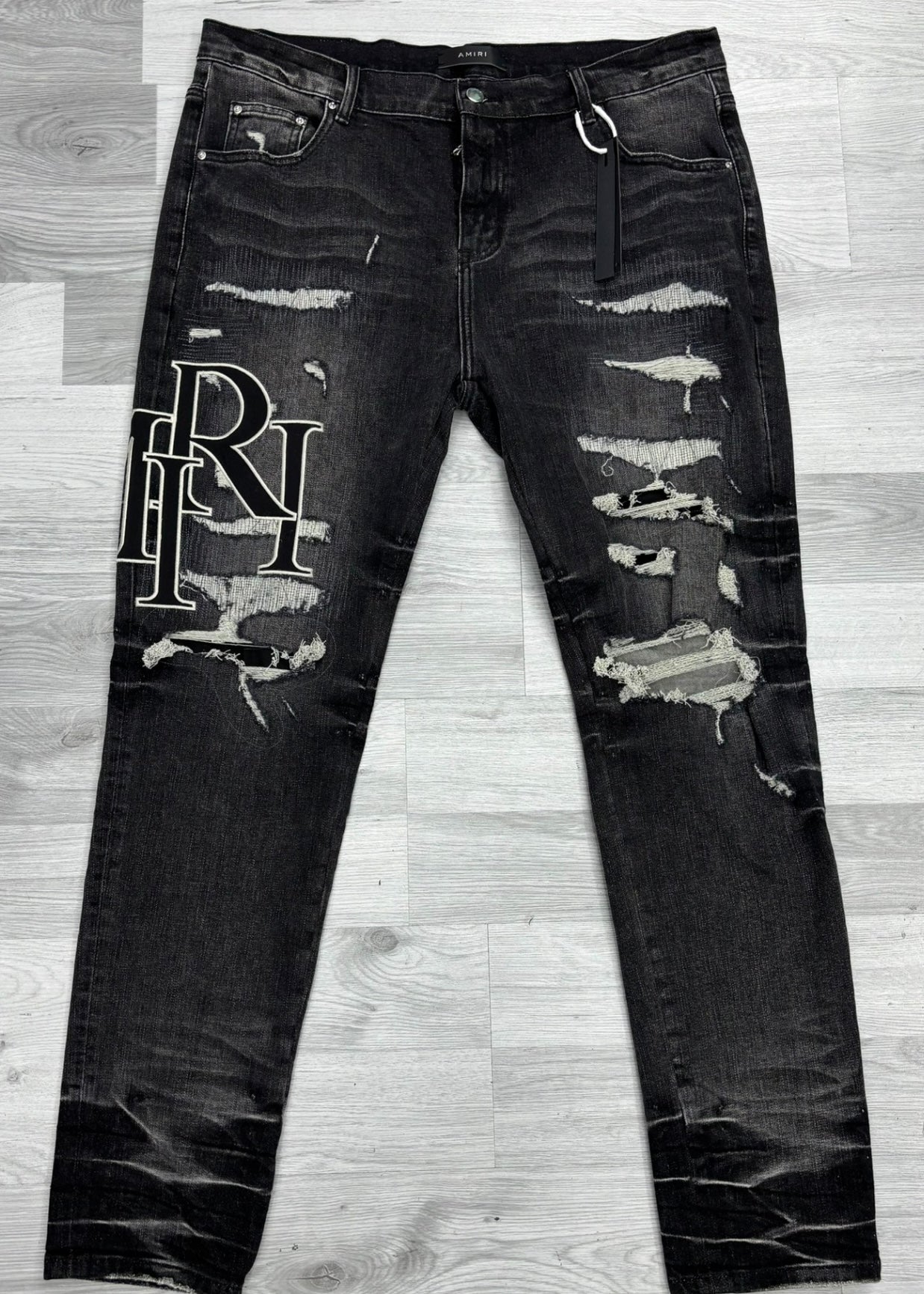Amiri Grey Faded Staggered Logo Jeans