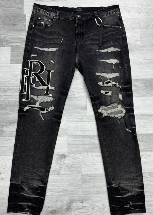Amiri Grey Faded Staggered Logo Jeans